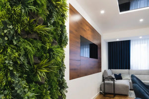 Pflanzenwand künstlich im Wohnzimmer von Naturewalls.